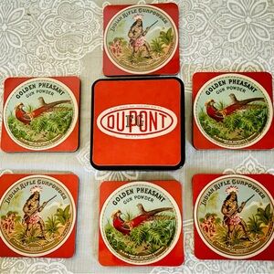 VINTAGE LACQUER COASTER SET “INDIAN RIFLE/GOLDEN PHEASANT” GUN POWDER AD UNUSED